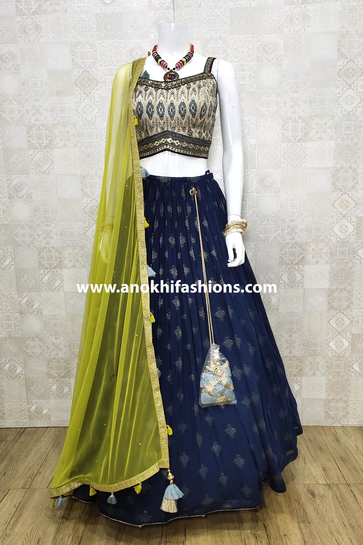 PINEAPPLE YELLOW LEHENGA WITH OYSTER FLORAL BLOUSE & AQUA BLUE DUPATTA –  Anisha Shetty