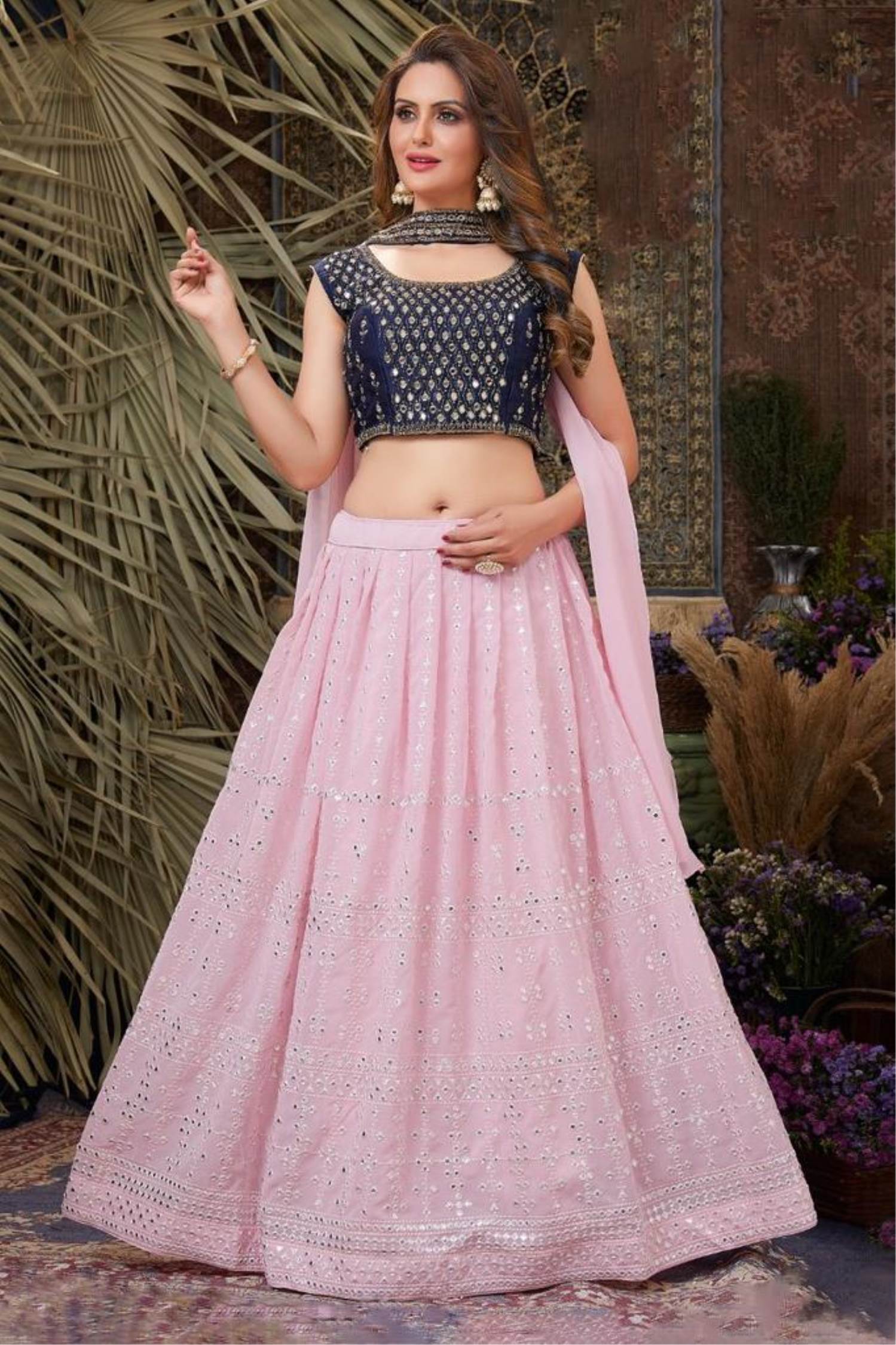 Here's a lehenga that you would love to flaunt! A royal beauty blue lehenga  with touches of pink and green. Grab it from our stores now... | Instagram