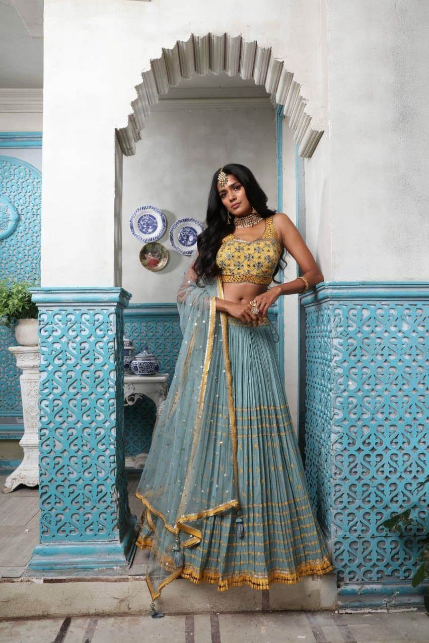Dreamy Sky Blue And Yellow Lehenga Choli | Designer lehenga choli, Indian  designer outfits, Red lehenga choli
