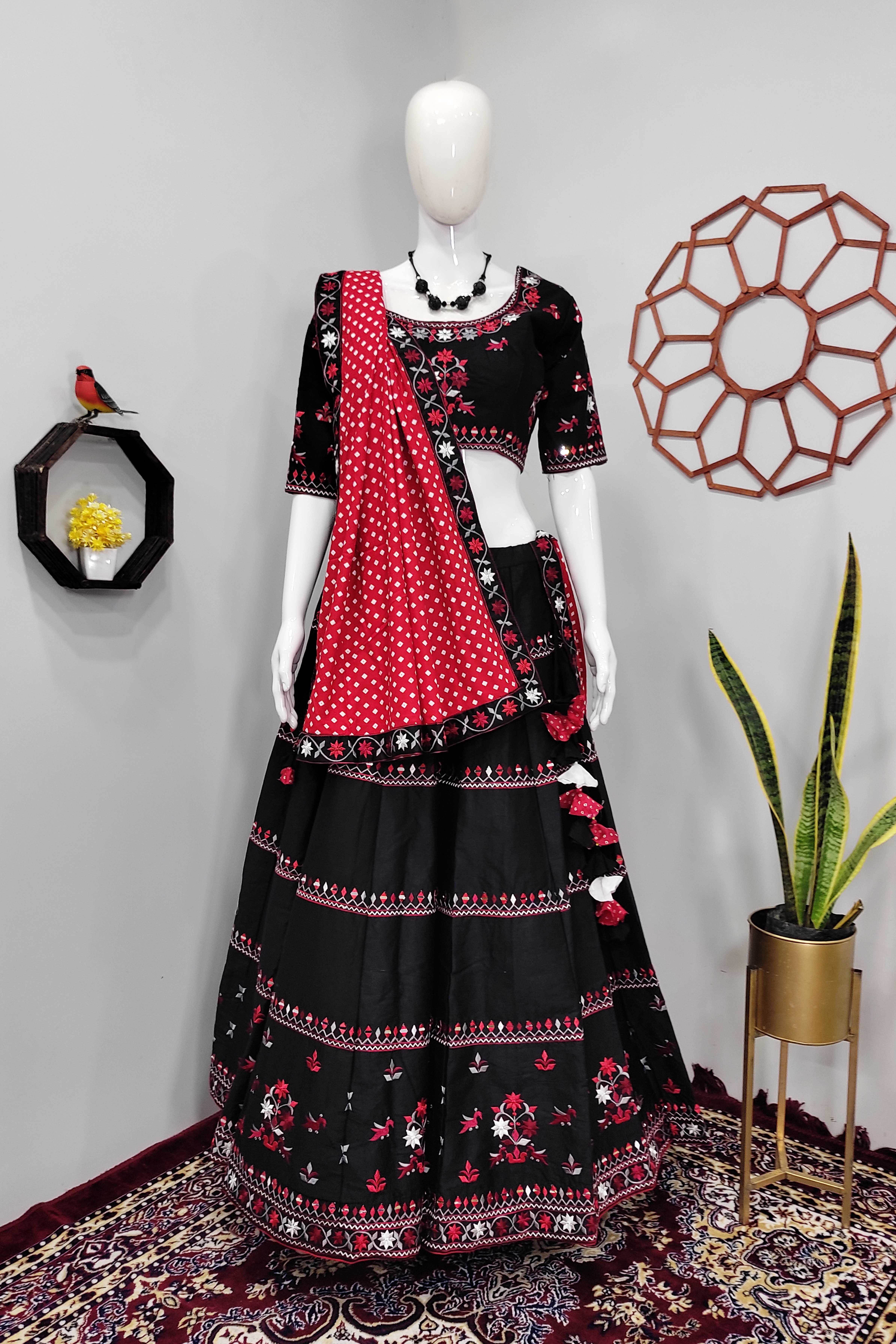 Red and black floral print lehenga with a net cape | Lehenga designs,  Indian designer wear, Latest lehenga designs